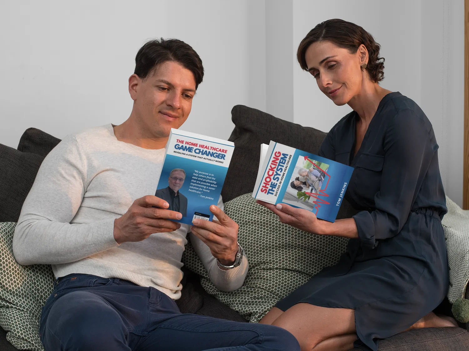 A couple reading Shocking the System and The Home Healthcare Game Changer at home